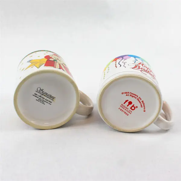 Lot of 2 Ceramic Coffee Mugs - Santa 'Seasons Greetings' & Birthday Balloons