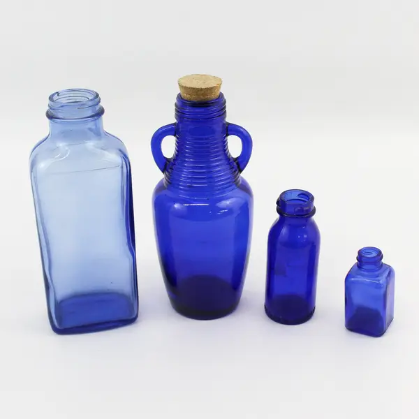 Lot of 4 Vintage Cobalt Blue Bottles