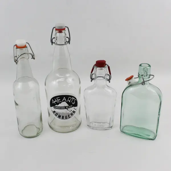Lot of Four Swing Top Bottles One 4 Hearts 32 oz Kombucha Bottle & Three Others