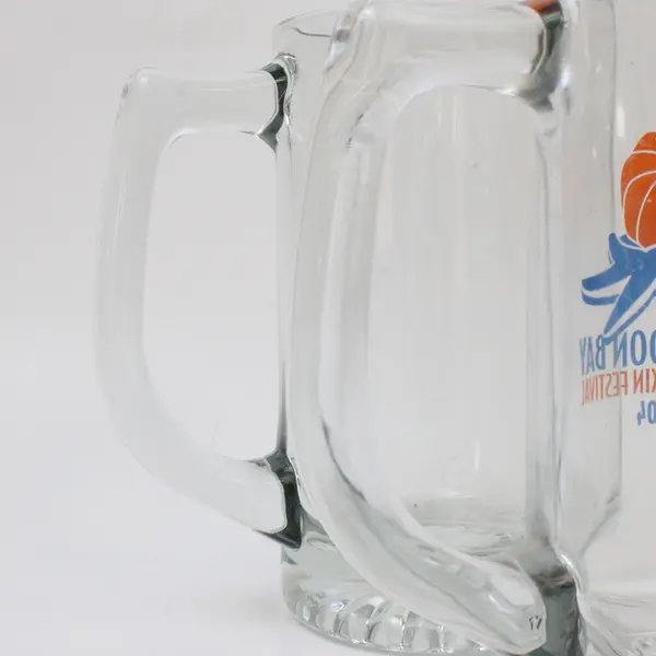 Lot of 2 Clear Glass Beer Mugs Textured Bases 1 Plain + Half Moon Bay 2004