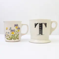 Lot of 2 Ceramic Coffee Mugs White Floral & Black 'T' Used