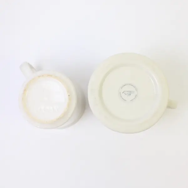 Lot of 2 Ceramic Coffee Mugs White Floral & Black 'T' Used