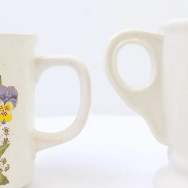 Lot of 2 Ceramic Coffee Mugs White Floral & Black 'T' Used