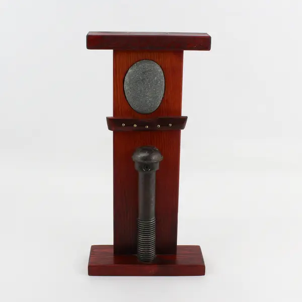 YRF Bolt and Stone Sculpture On Cherry Stained Wood