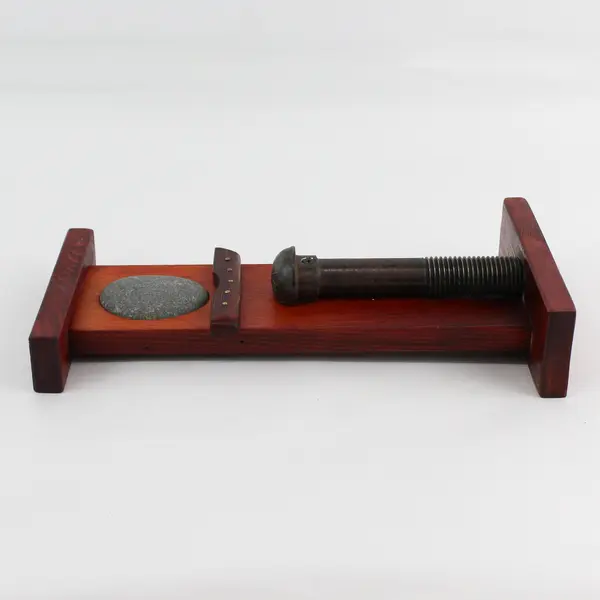 YRF Bolt and Stone Sculpture On Cherry Stained Wood