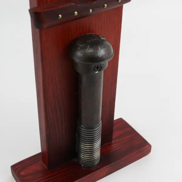 YRF Bolt and Stone Sculpture On Cherry Stained Wood
