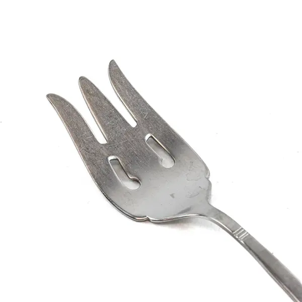 Oneida Deluxe Stainless Cold Meat Serving Fork in the Pattern Nordic Crown