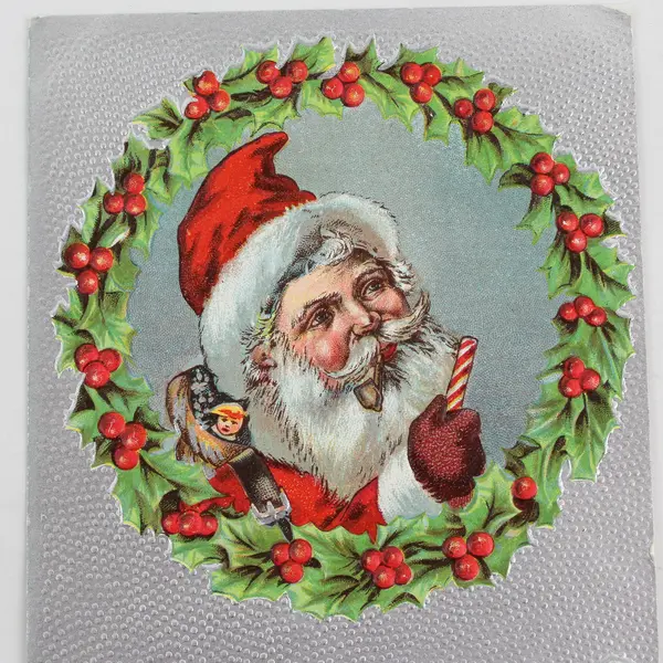 1908 Santa Claus Pipe Candy Cane Holly Wreath Embossed Postcard Corvallis OR 