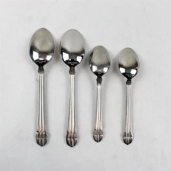 Lot of Four 18/10 Stainless Spoons From International Silver in Pattern INS453