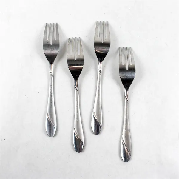 Four Stainless Swirl Sand Salad Forks by Cambridge. Made in China.