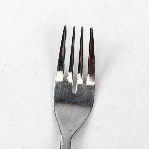 Four Stainless Swirl Sand Salad Forks by Cambridge. Made in China.
