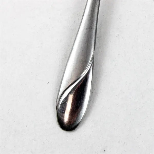 Four Stainless Swirl Sand Salad Forks by Cambridge. Made in China.