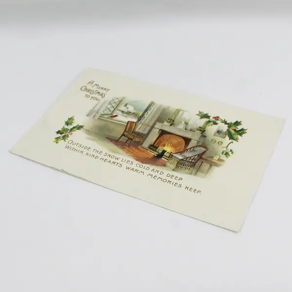 1909 A Merry Christmas To You Fireside Scene Holly Embossed Postcard 