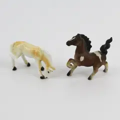 Lot of 2 Porcelain Horse Miniatures Prancing Pinto and Palomino