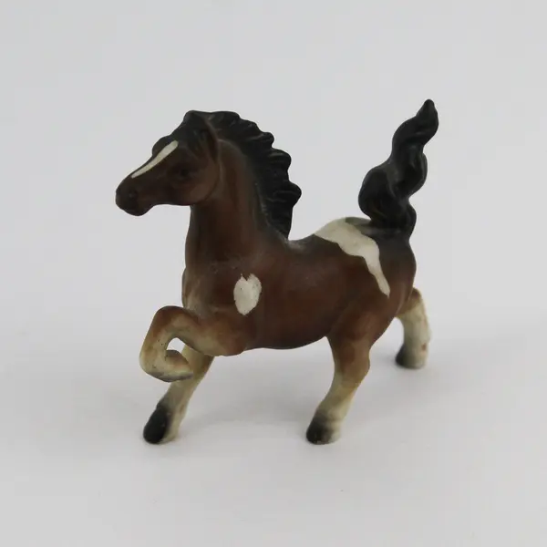 Lot of 2 Porcelain Horse Miniatures Prancing Pinto and Palomino