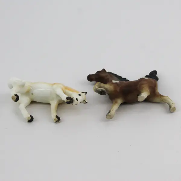 Lot of 2 Porcelain Horse Miniatures Prancing Pinto and Palomino
