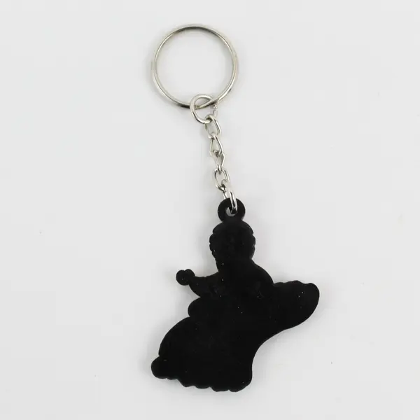 Vintage Rubber Harrah’s Casino Genie on Magic Flying Carpet Standard Keychain 
