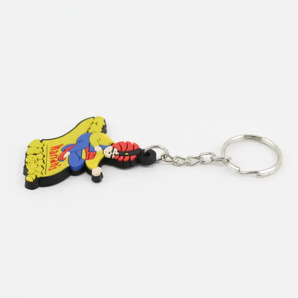 Vintage Rubber Harrah’s Casino Genie on Magic Flying Carpet Standard Keychain 