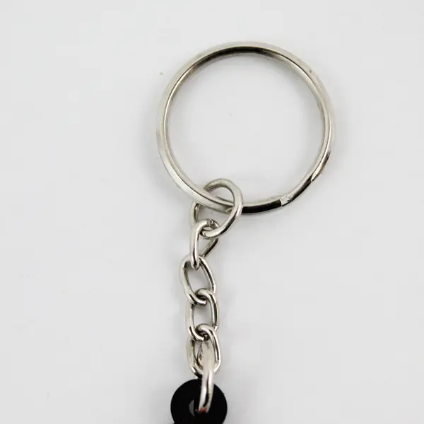 Vintage Rubber Harrah’s Casino Genie on Magic Flying Carpet Standard Keychain 