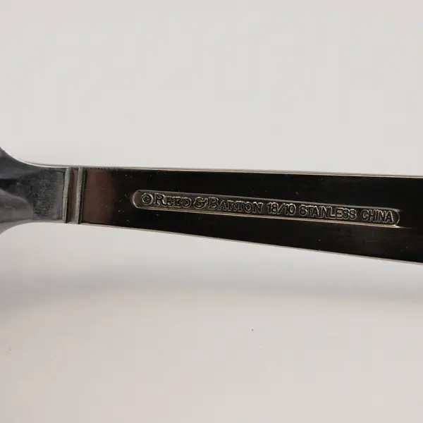 Reed and Barton 18/10 Stainless Slotted Spoon in the Pattern Harvest Bouquet