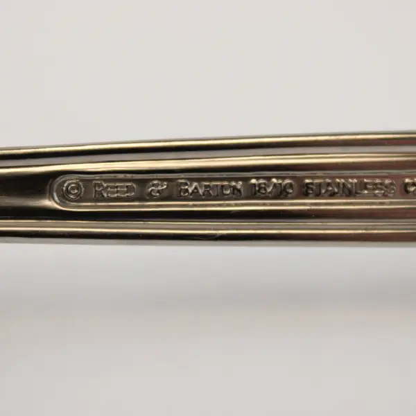 Reed and Barton  Stainless Slotted Salad Serving Fork in the Pattern Endicott