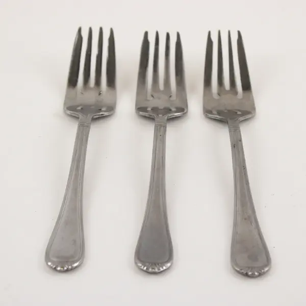 Three Stainless Salad Forks by International  in the Pattern Nouveau