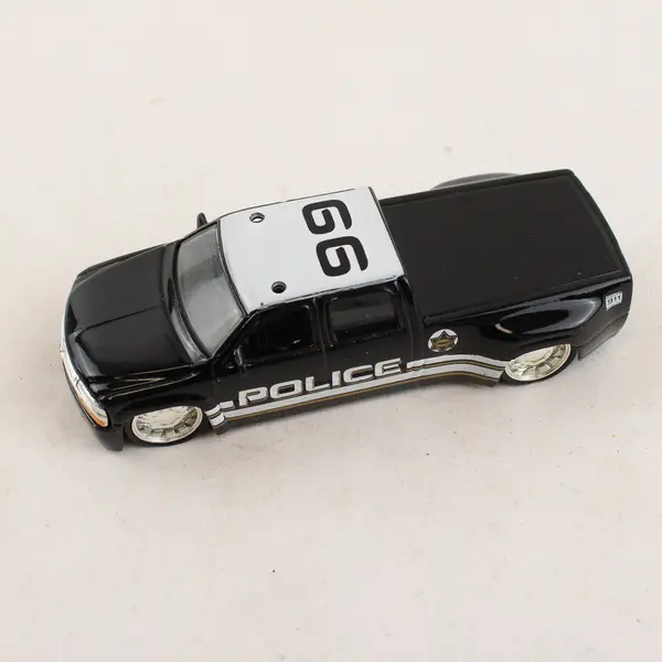 Jada Toys 1999 Silverado Toy Car Black Police Truck 1:64
