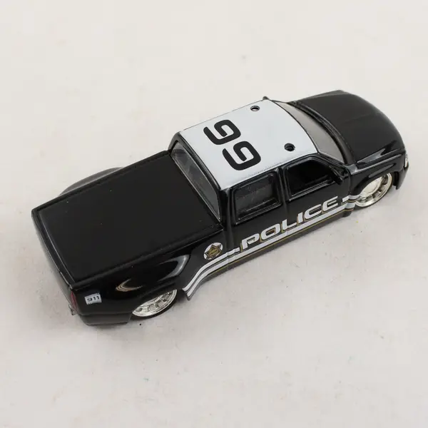 Jada Toys 1999 Silverado Toy Car Black Police Truck 1:64
