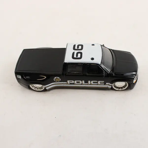 Jada Toys 1999 Silverado Toy Car Black Police Truck 1:64