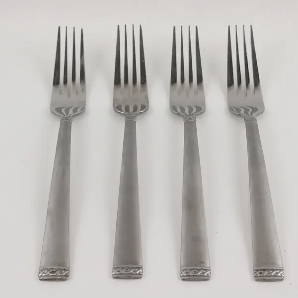 Four Stainless Dinner Forks in the Pattern INS651 Made in China