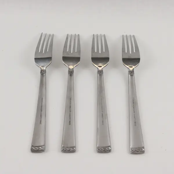 Four Stainless Dinner Forks in the Pattern INS651 Made in China