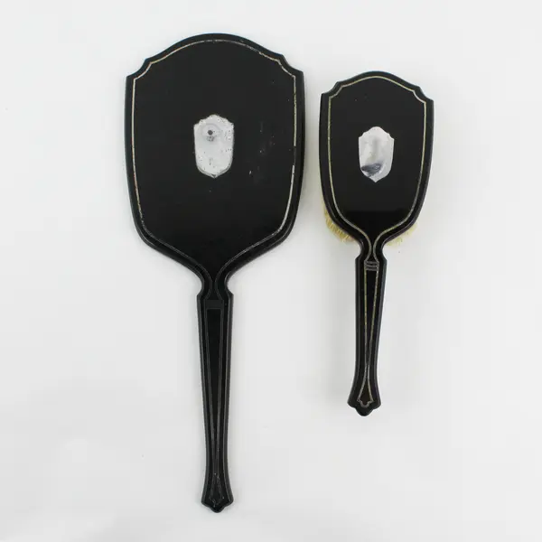 Vintage Vanity Black Celluloid or Bakelite Hand Mirror And Hair Brush Black 