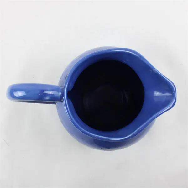 Used Unbranded Cornflower Blue Pitcher With Large Handle and Pouring Spout