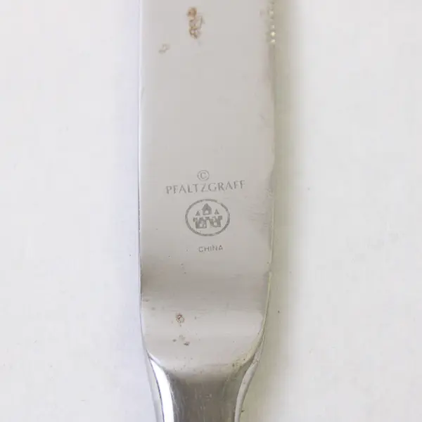 Three Stainless Pfaltzgraff Dinner Knives in the Pattern Portrait
