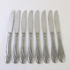 Eight Pfaltzgraff Dinner Knives in the Pattern PFF38