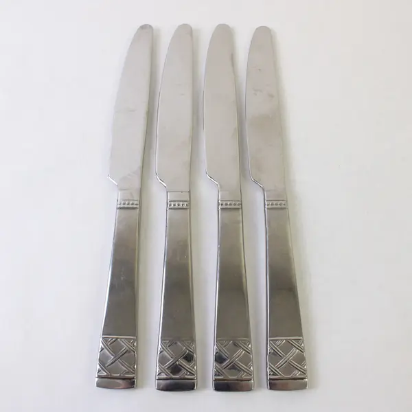 Four Avalene Dinner Knives by Mikasa