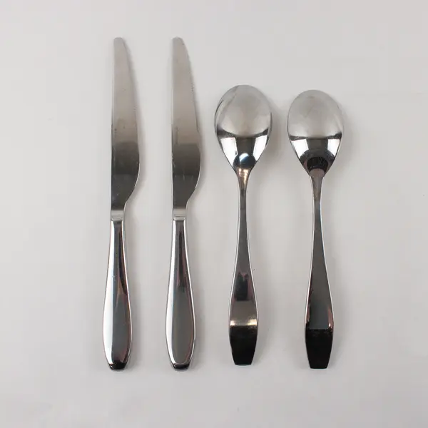 Two Stainless Tablespoons and Two Dinner Knives by Towle in the Pattern Symphony