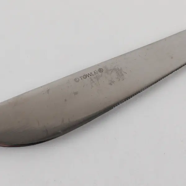 Two Stainless Tablespoons and Two Dinner Knives by Towle in the Pattern Symphony