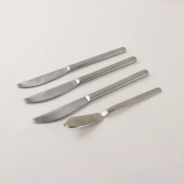 Three Dinner and One Butter Knife in the Pattern Pela from Lauffer by Towle