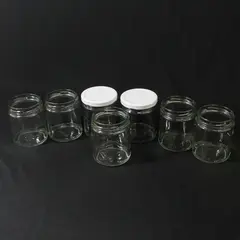 Lot of 7 Glass Jars For Jams or Jellies Approximately 1/2 Pint