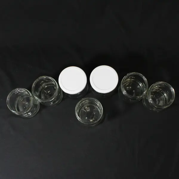 Lot of 7 Glass Jars For Jams or Jellies Approximately 1/2 Pint