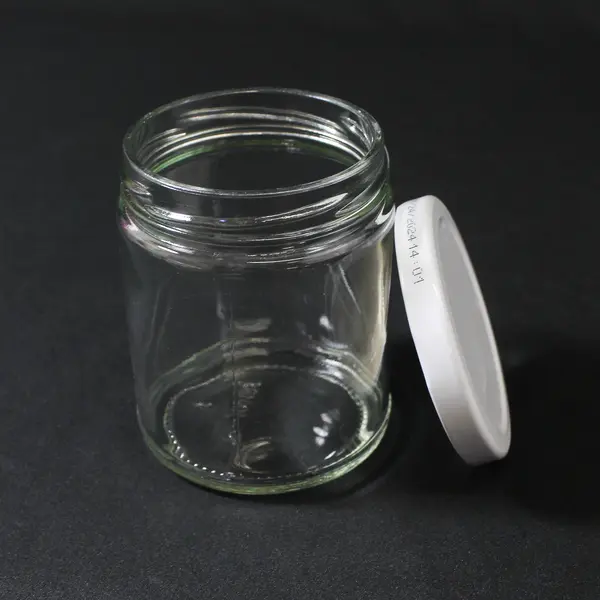 Lot of 7 Glass Jars For Jams or Jellies Approximately 1/2 Pint