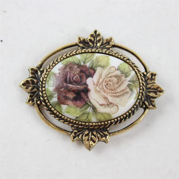 Vintage Sarah Coventry Rose Marie Gold-Tone Pendant
