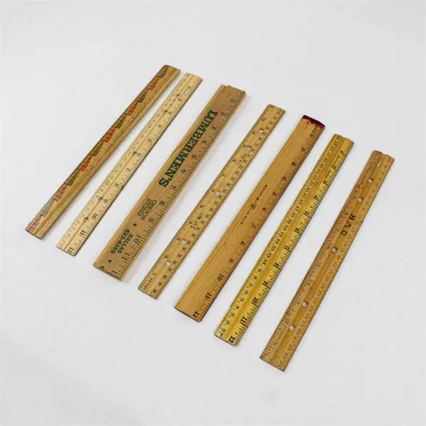 Lot of Seven Flawed but Usable Twelve-Inch Wooden Rulers