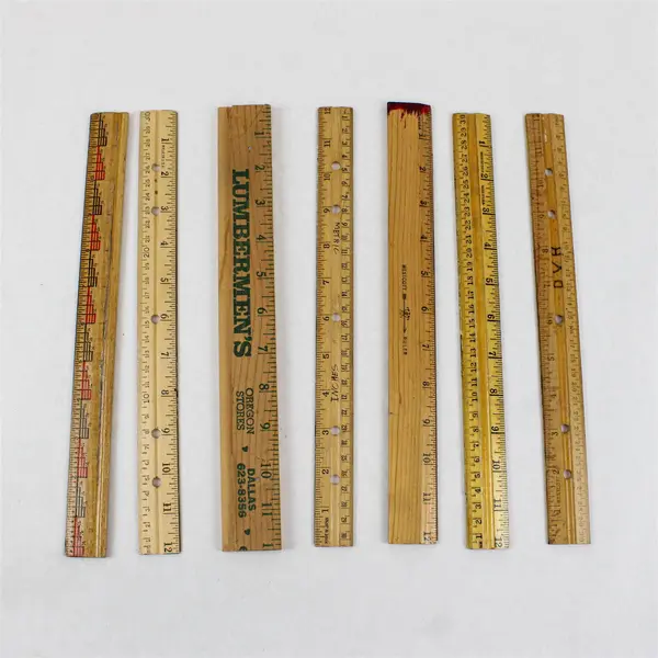Lot of Seven Flawed but Usable Twelve-Inch Wooden Rulers