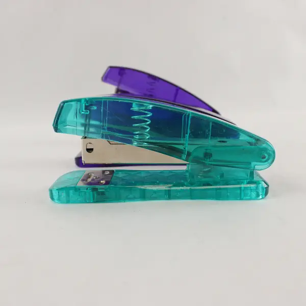 Lot of Three Small Unbranded Staplers - 2 Purple, 1 Turquoise Staples Included