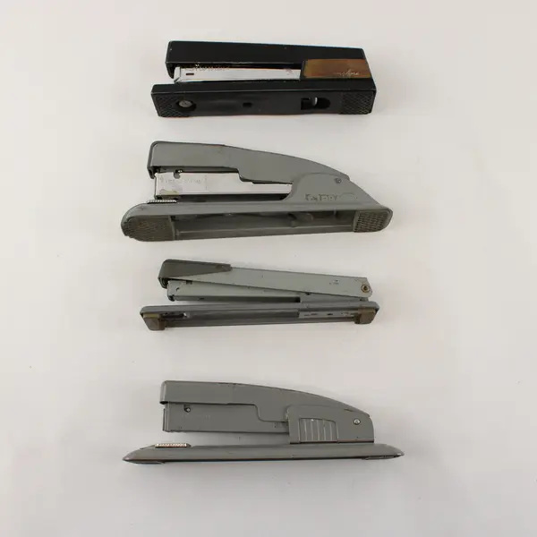 Four Vintage Swingline Staplers Gunmetal Grey (3) &  one w/ Woodgrain Pattern 