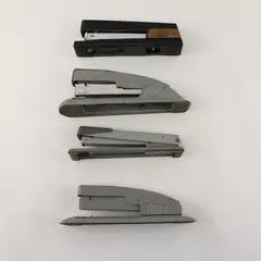 Four Vintage Swingline Staplers Gunmetal Grey (3) &  one w/ Woodgrain Pattern 