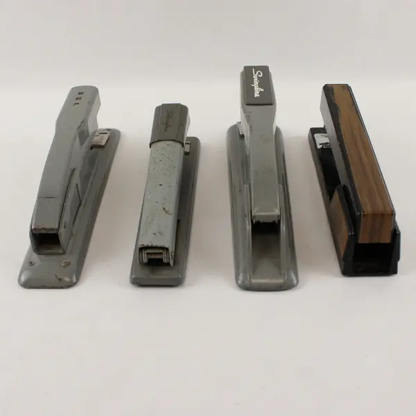 Four Vintage Swingline Staplers Gunmetal Grey (3) &  one w/ Woodgrain Pattern 