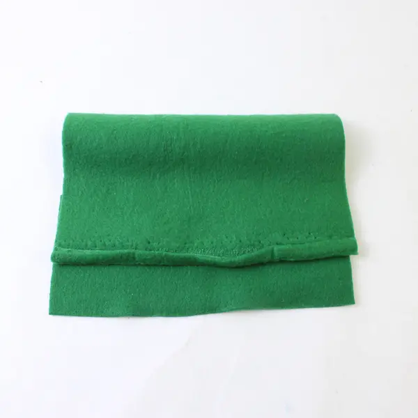 Piece of Dark Green  Felt Material 36"x42" plus a small square piece 